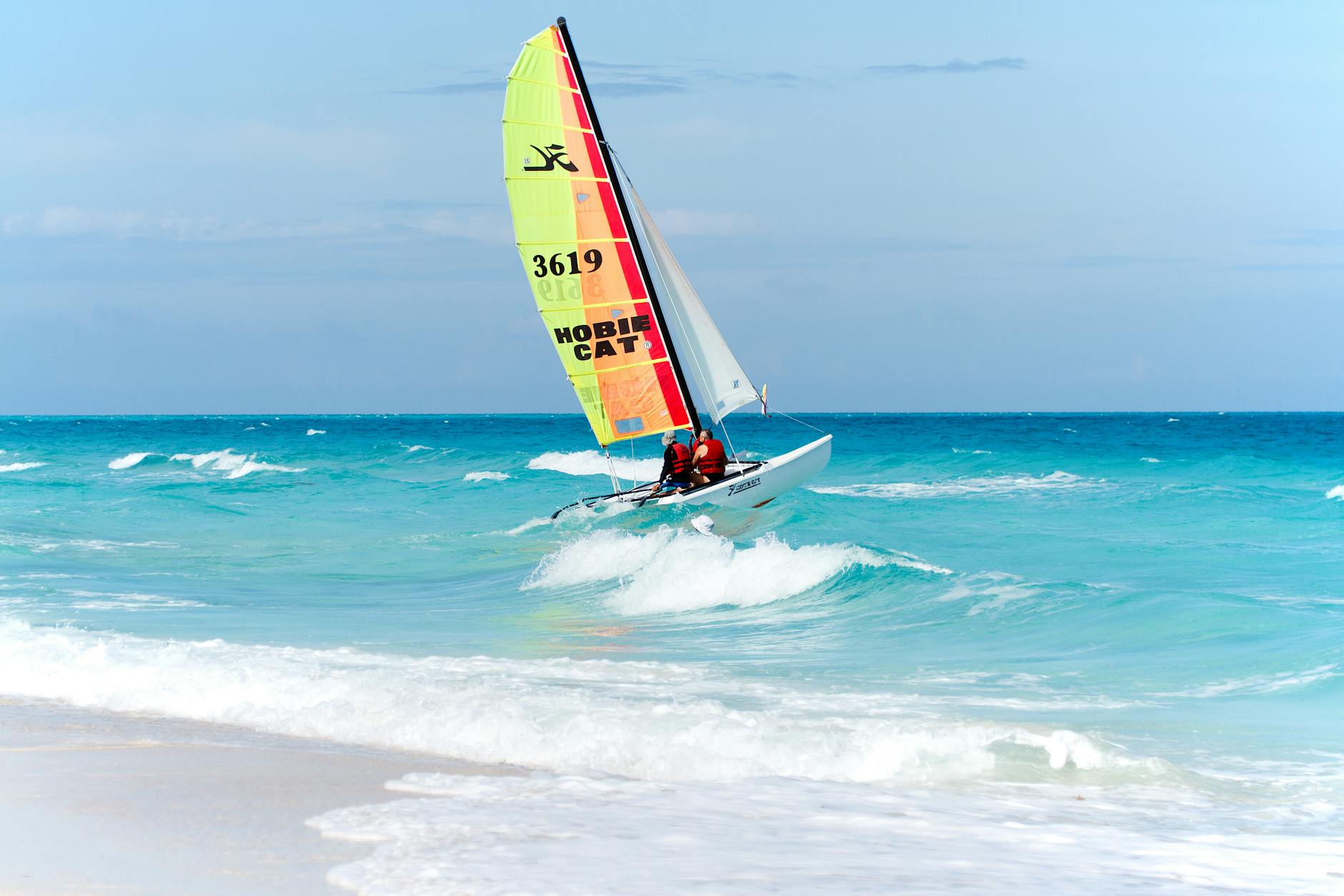 sailboat in tropical blue sea